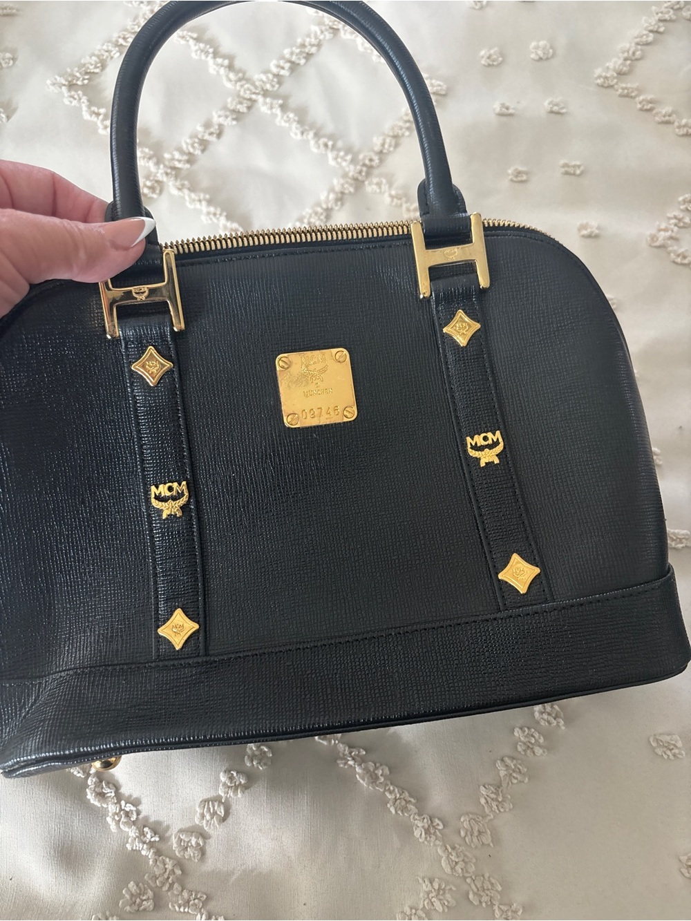 MCM Black Saffiano Satchel with Gold Hardware. One side of zipper missing handle